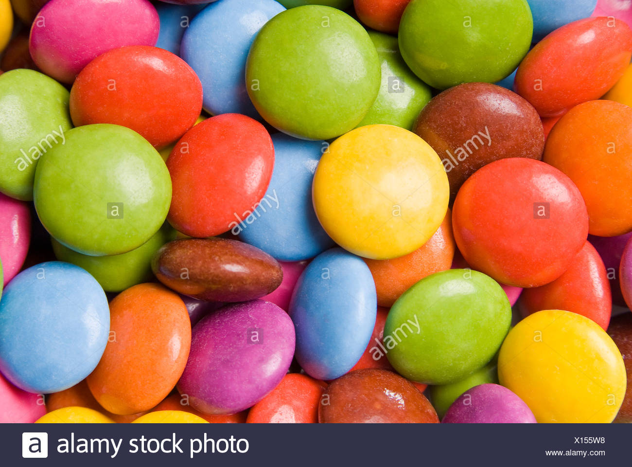 Colorful Sugar Coated Chocolate Stock Photos & Colorful Sugar Coated