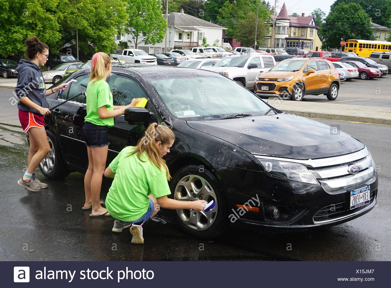 Girl Washing Car High Resolution Stock Photography and Images Alamy