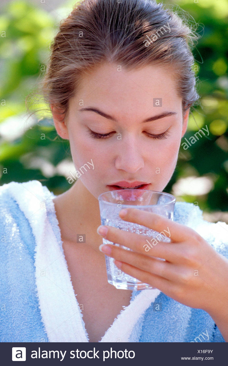 Cropped Image Of Brunette Female Short Hair Swept Back Wearing A