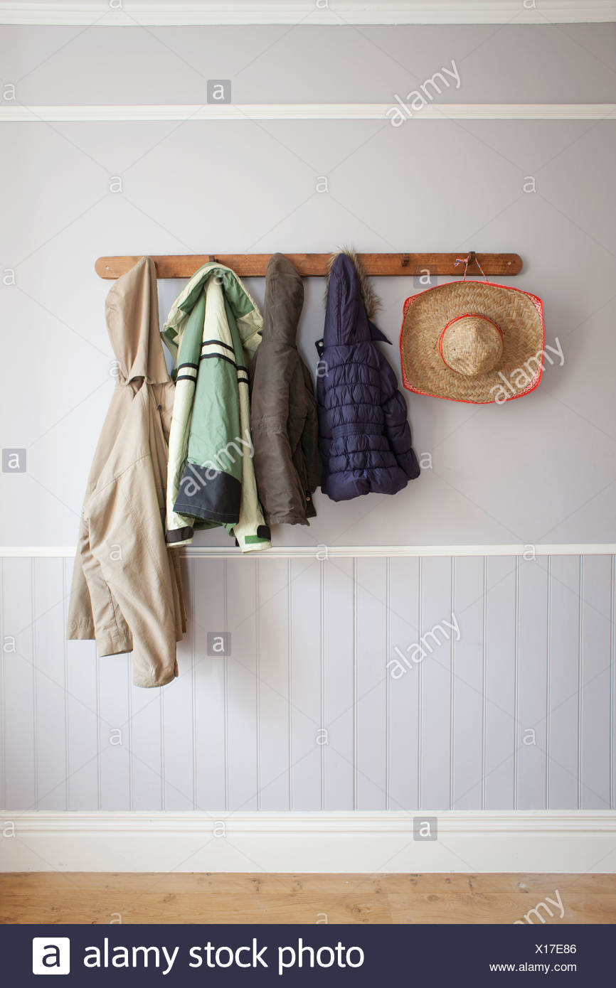 hall clothes rack on Coats And Hat On Coat Rack Stock Photo Alamy