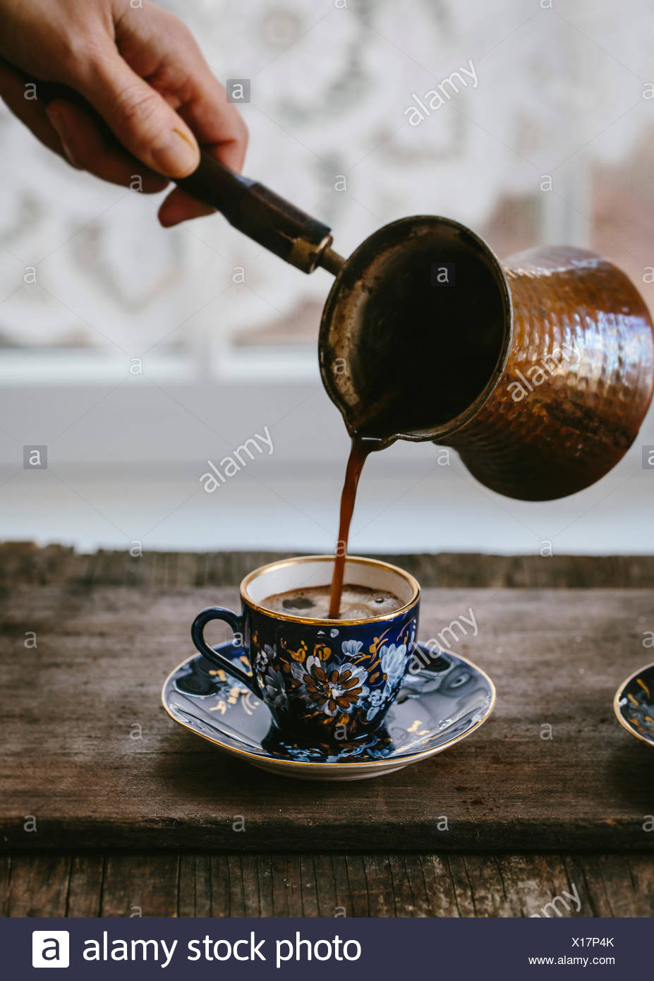 A Woman Is Pouring Turkish Coffee In To A Vintage Turkish Coffee Cup Stock Photo Alamy