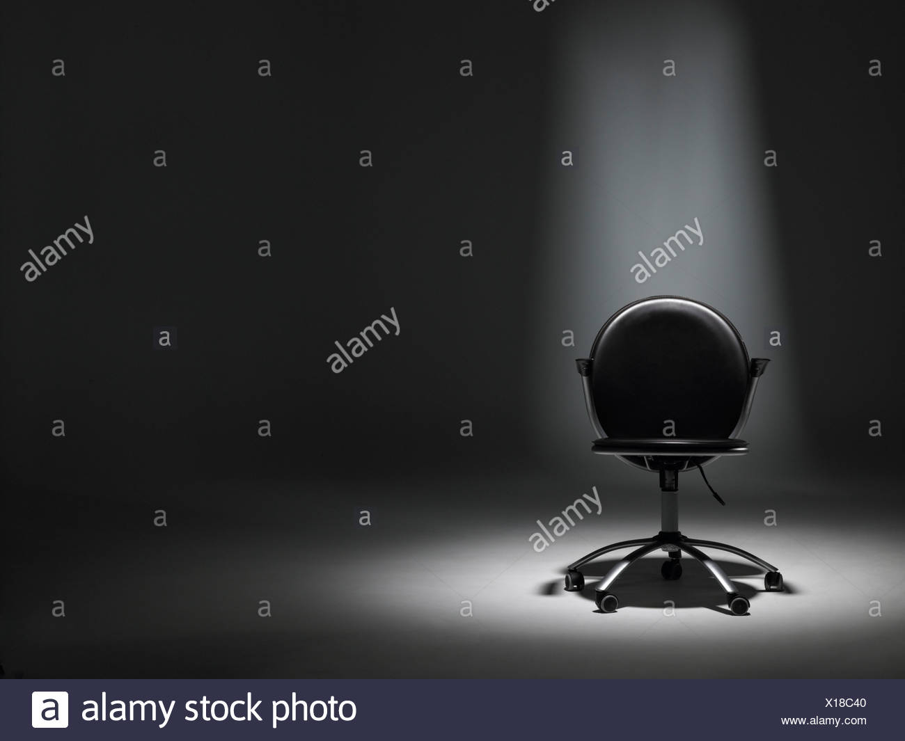Office Chair In Spotlight High Resolution Stock Photography and Images