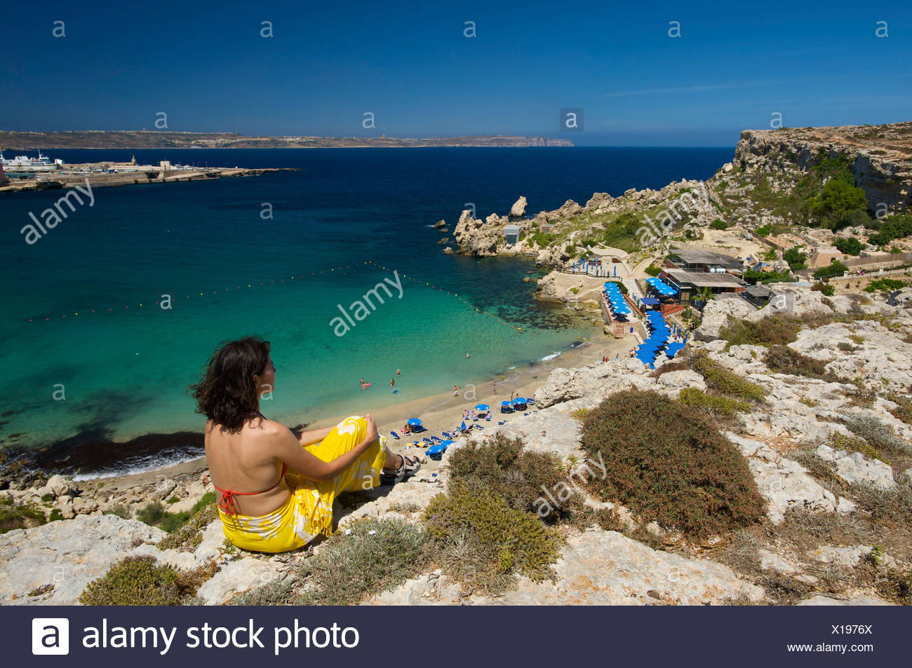 Woman Looking On Paradise Bay In Cirkewwa Malta Europe Stock Photo Alamy