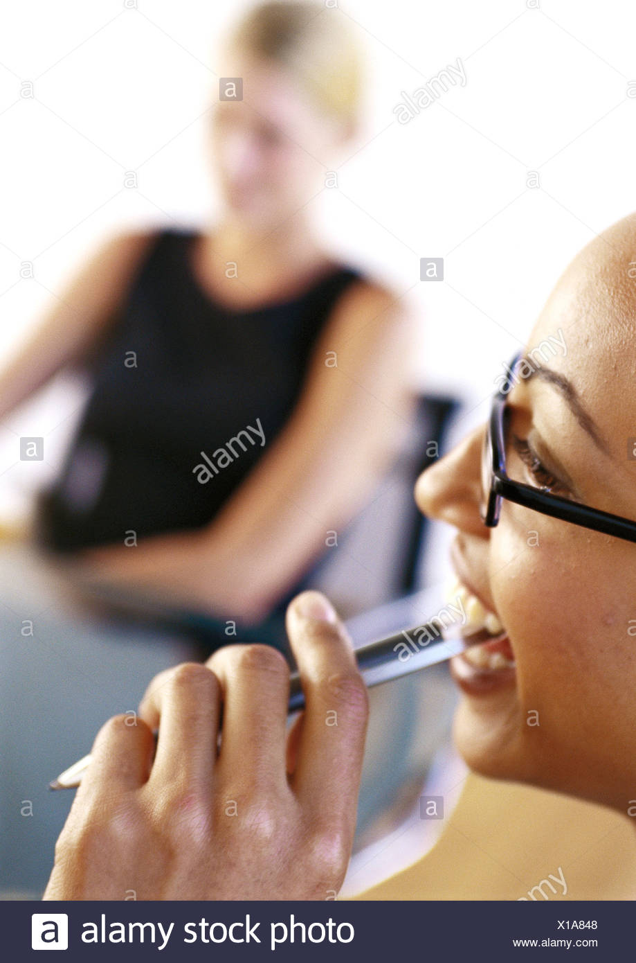 Woman Pen In Mouth High Resolution Stock Photography and Images Alamy