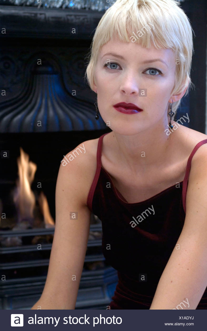 Female Short Blonde Hair Dark Red Lipstick Wearing Black
