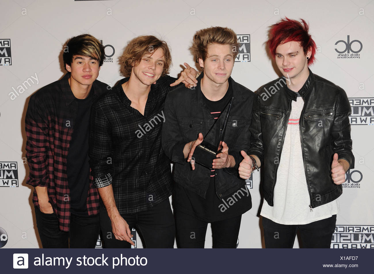 L R Musicians Michael Clifford Luke Hemmings Calum Hood And