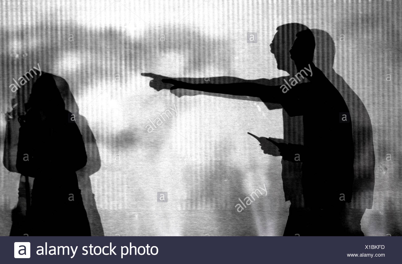 fear silhouette threat subordination authoritarian child man contrast Stock Photo