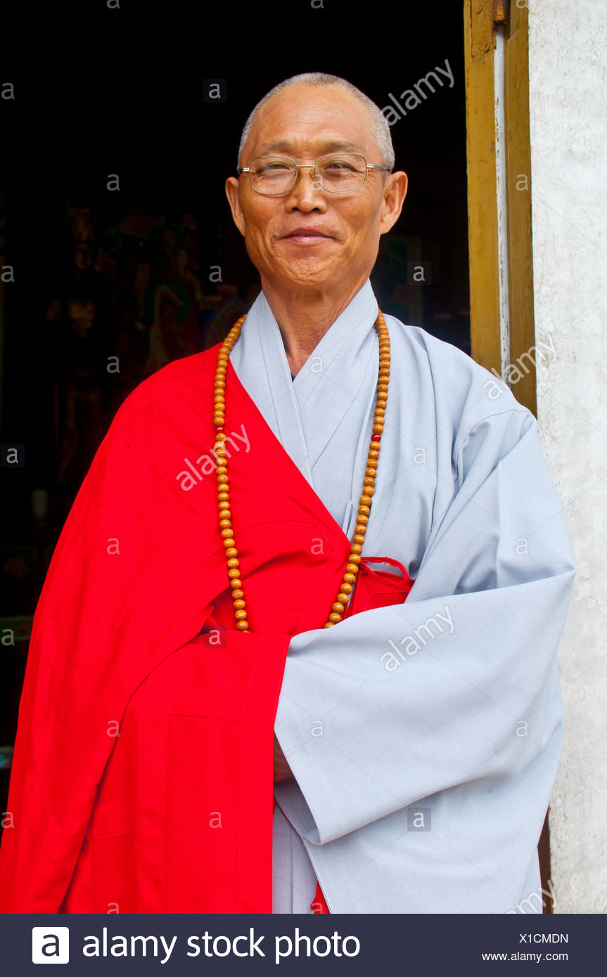 Elderly monk at the Buddhist Pohyon Temple on Mount Myohyang-san, North Korea, Asia Stock Photo
