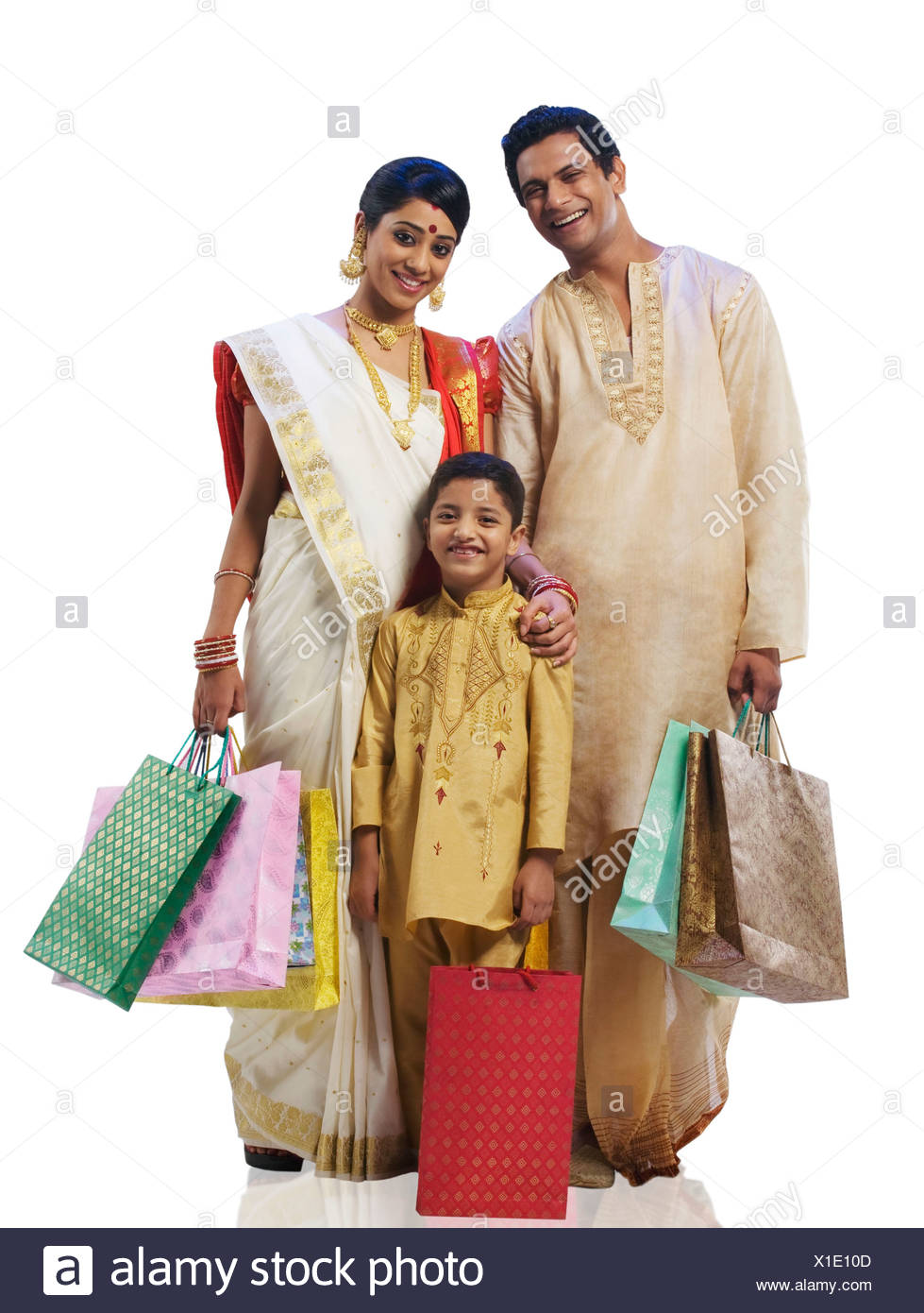 bengali family shopping bags high resolution stock photography and images alamy https www alamy com bengali family with shopping bags image276288669 html