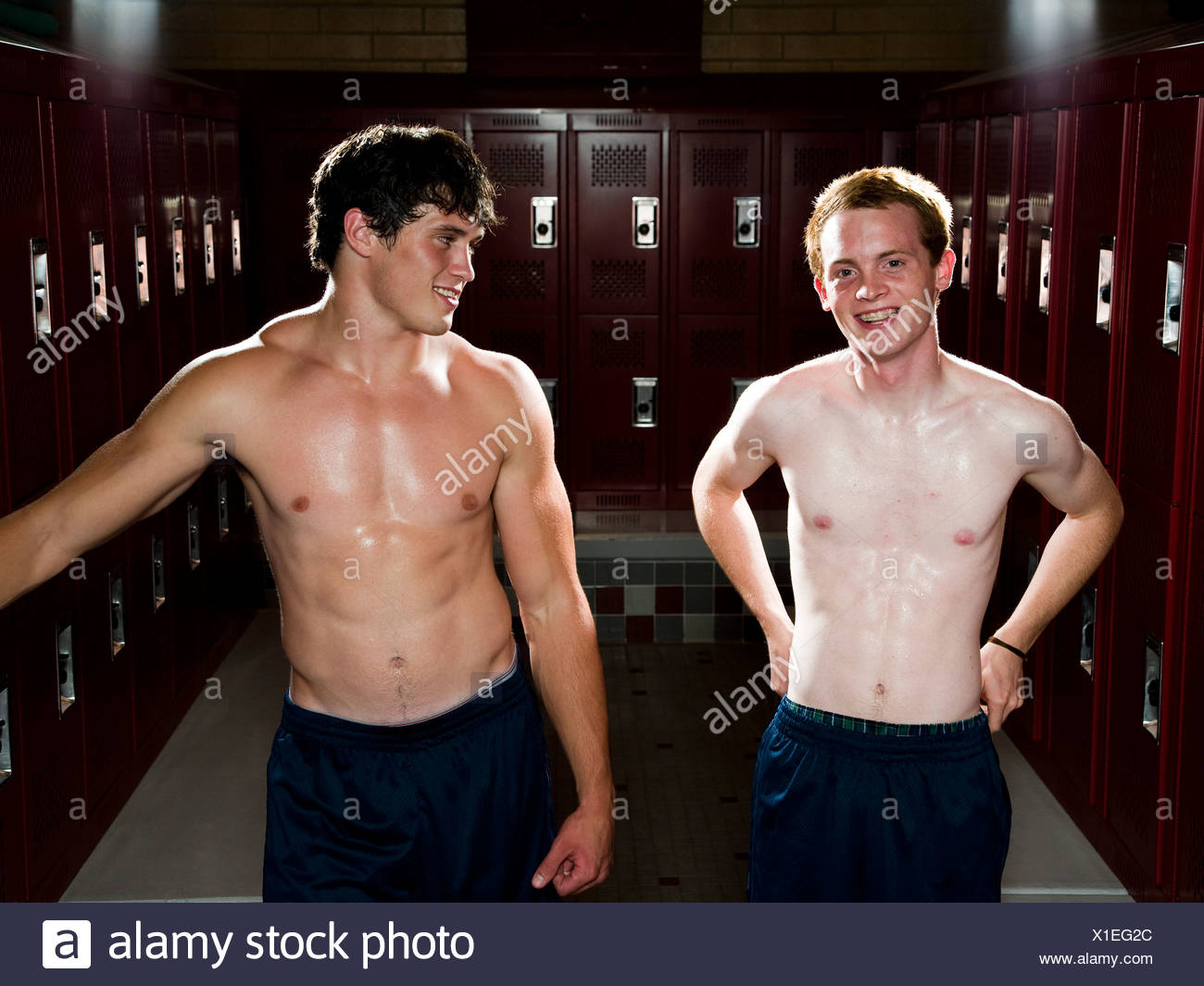 Two High School Students In A Locker Room Stock Photo