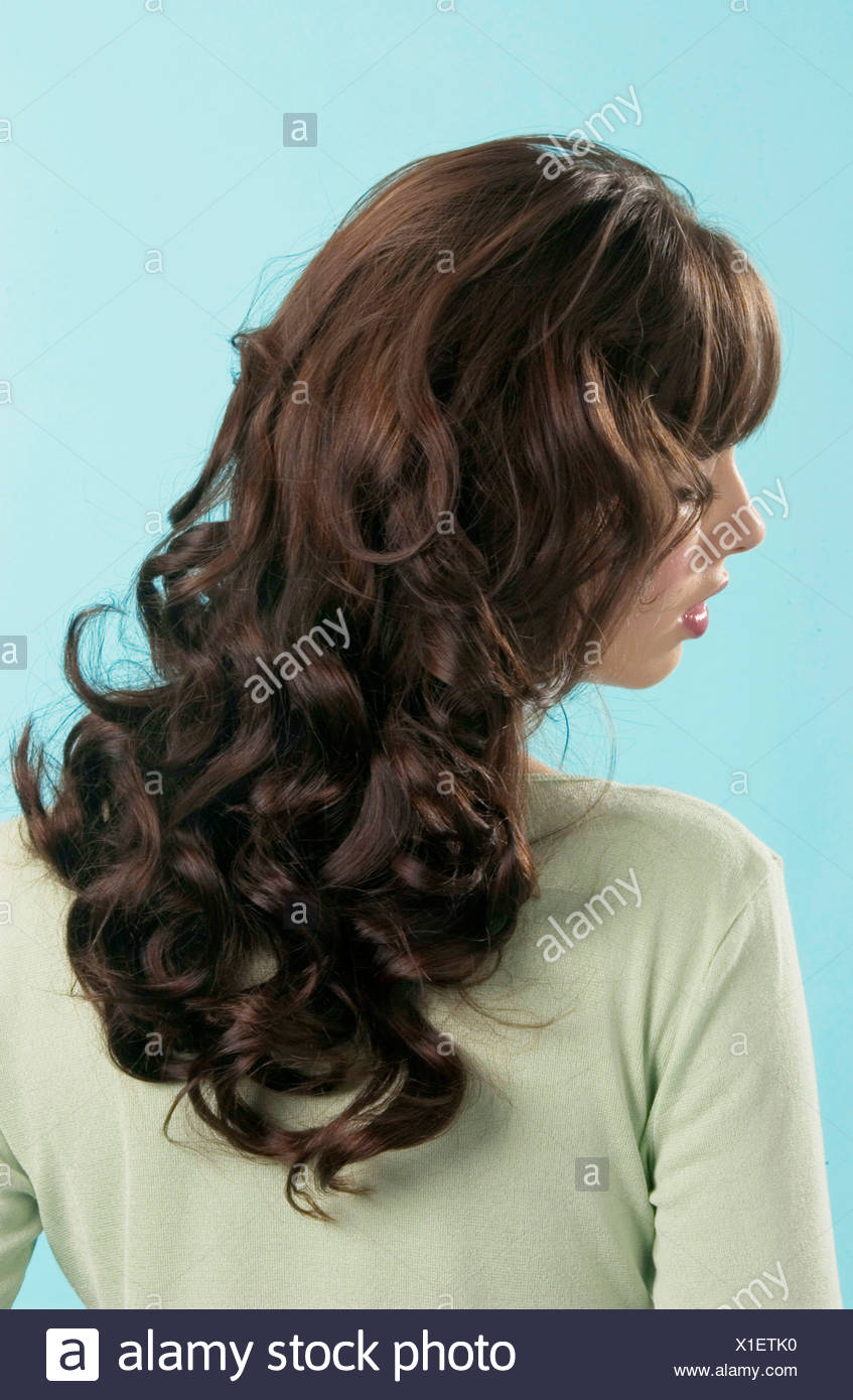 Back View Semi Profile Of Female Long Curly Brunette Hair Fringe
