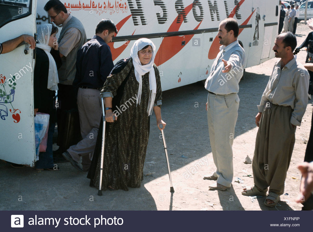 Kurdish Woman With Crutches Returning From Exile In Iran Kurdistan Iraq 04 Stock Photo Alamy