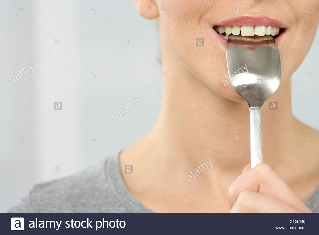 Silver Spoon Mouth High Resolution Stock Photography and Images Alamy