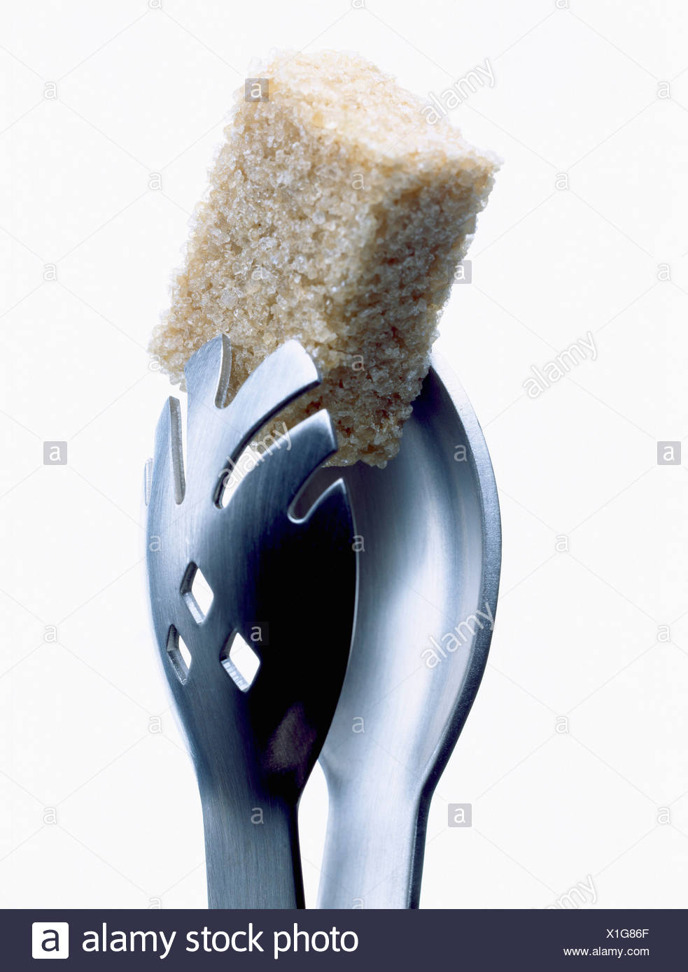 Lump Of Brown Sugar In Sugar Tongs Stock Photo 276338231 Alamy