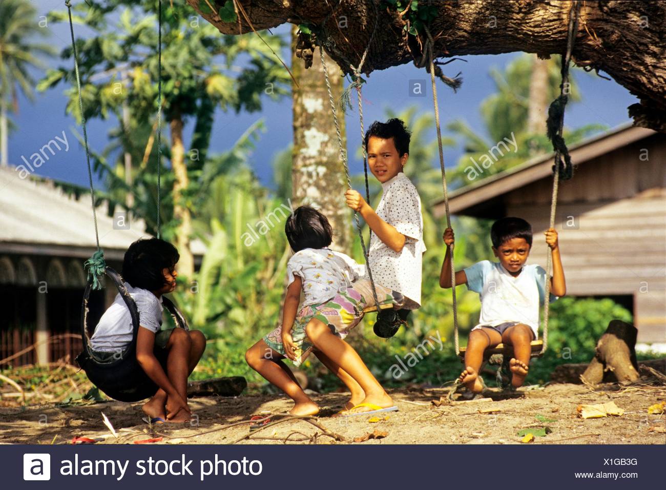 Children Swinging Sumatra Island Republic Of Indonesia