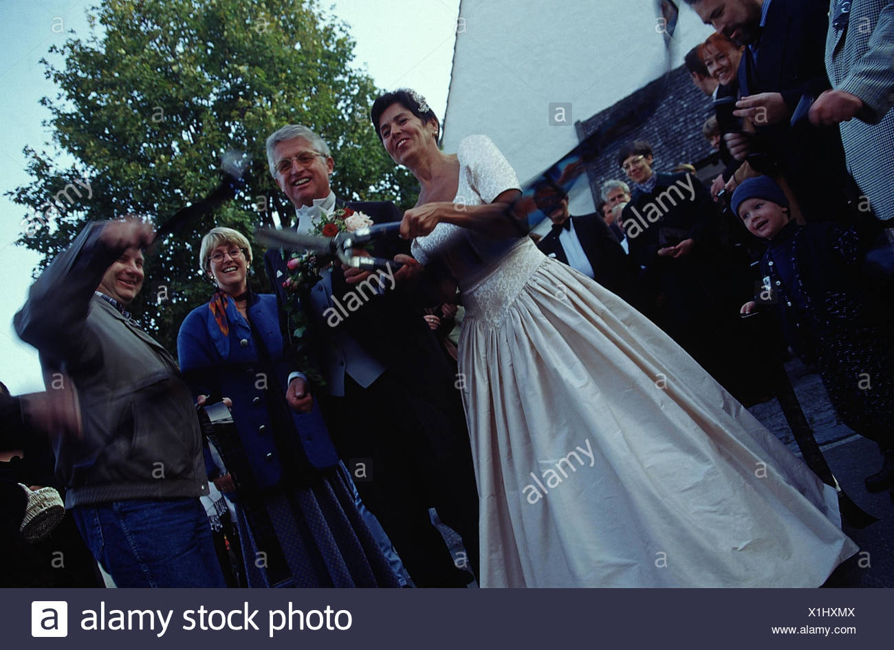 Church Wedding Couple Wedding Guests Trellises Cords Wedding