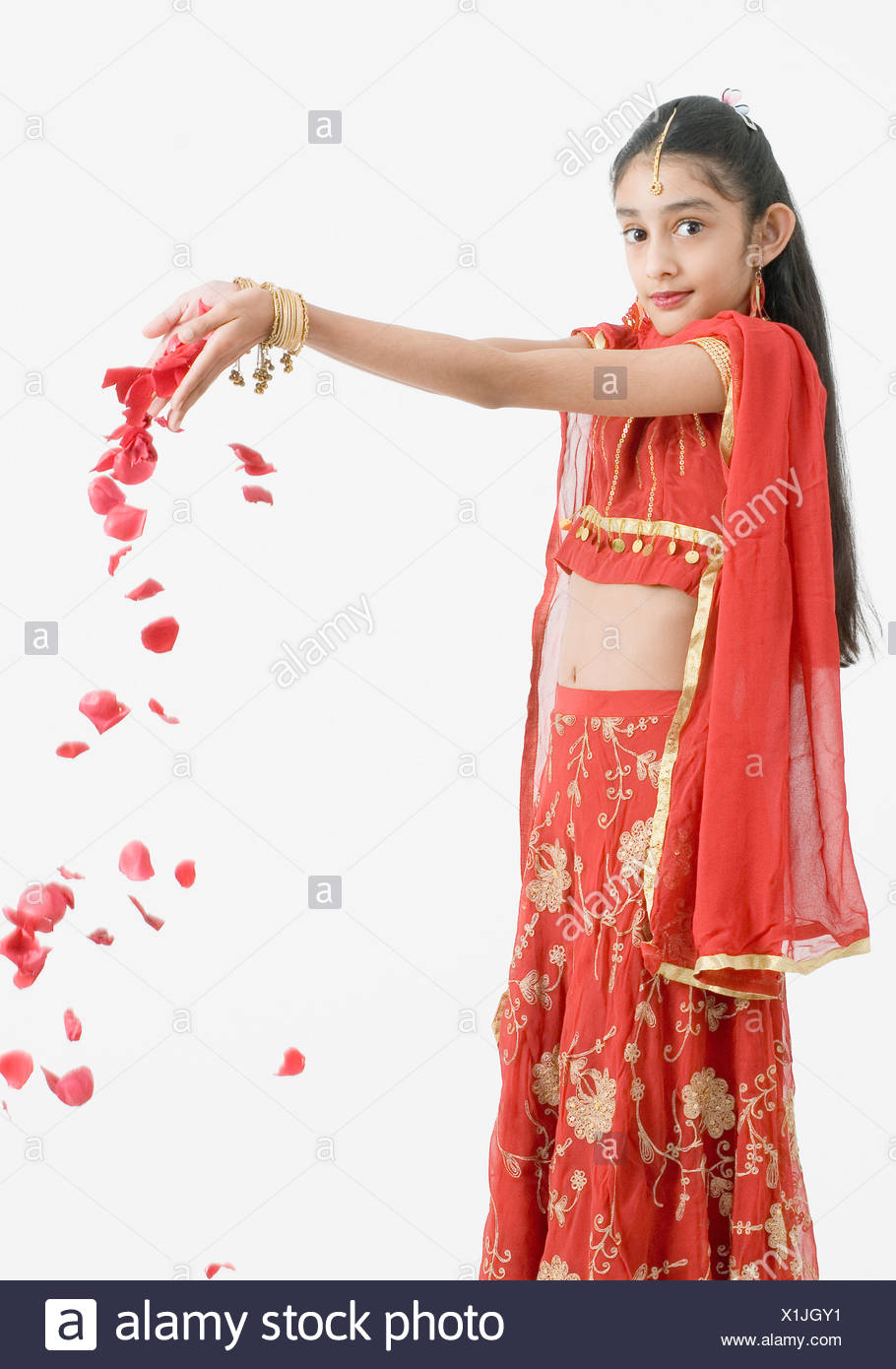 flower girl dropping petals
