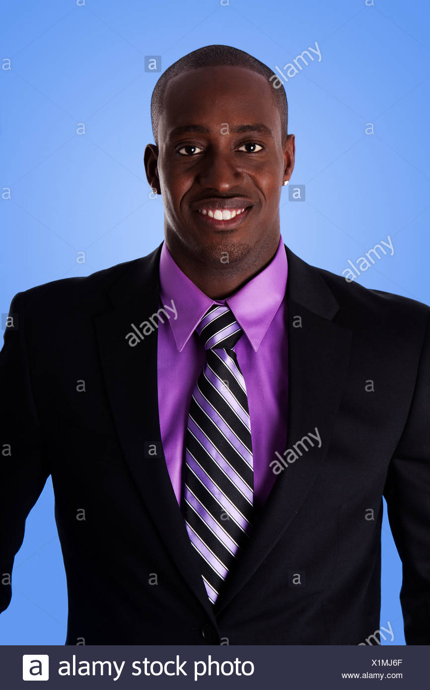 black suit and purple shirt