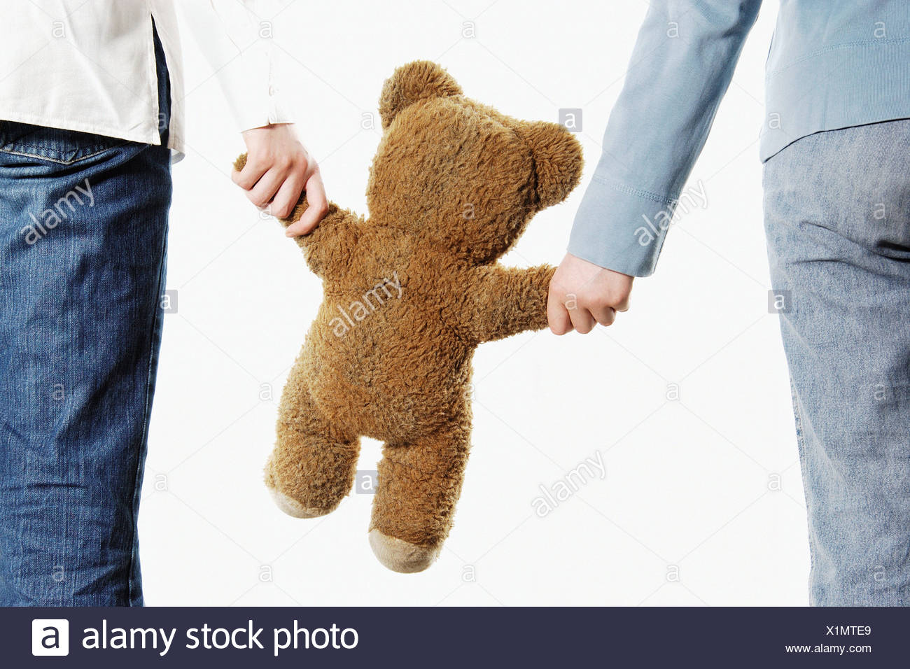 holding a teddy bear