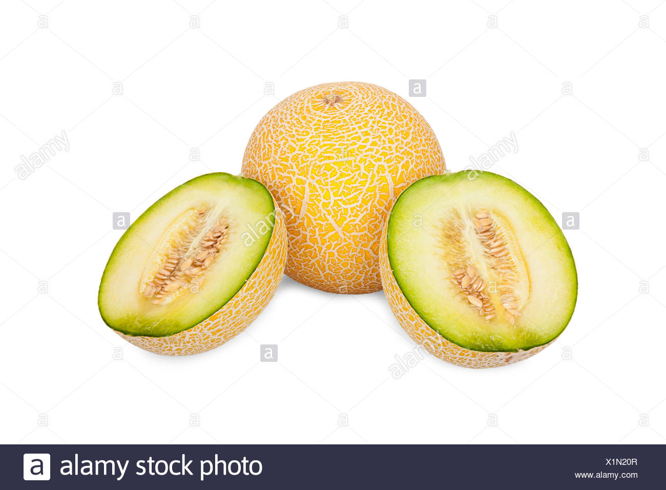 EIne ganze und zwei halbe Galiamelonen isoliert vor weißem Hintergrund Stock Photo