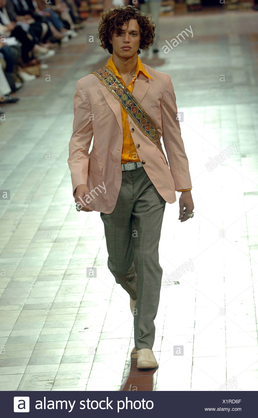 orange shirt grey pants