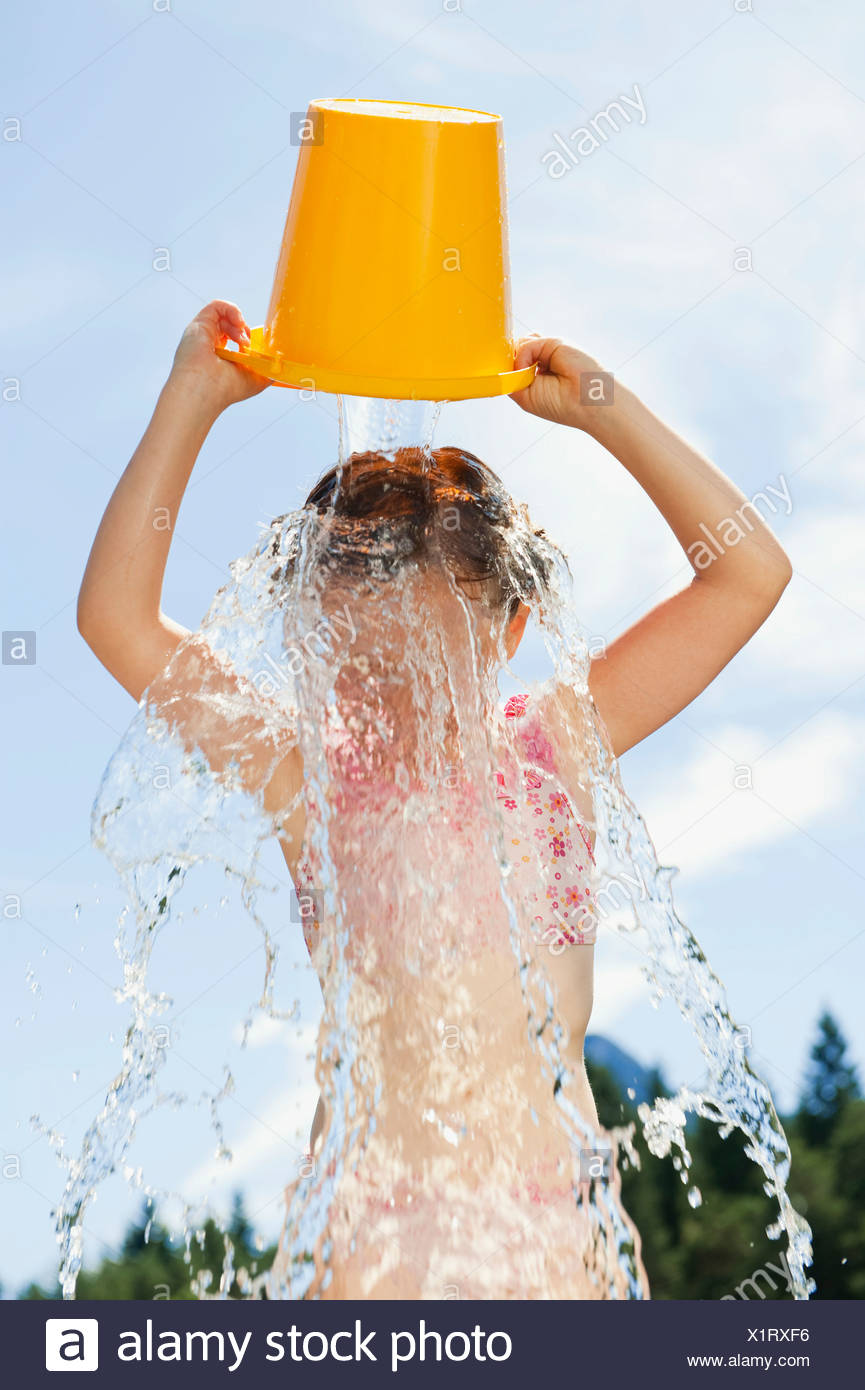 Bucket Water Over Head Stock Photos & Bucket Water Over Head Stock