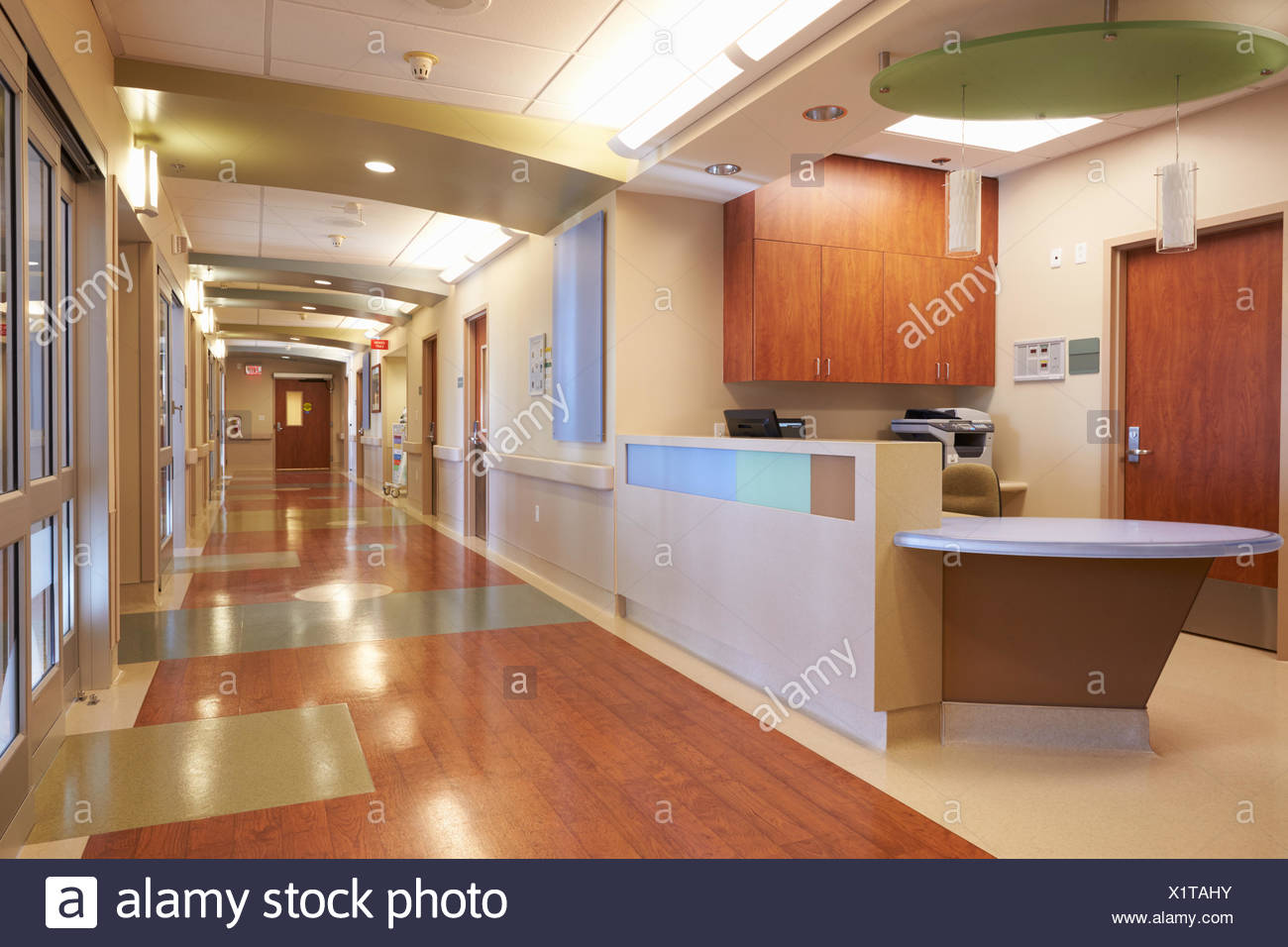 Empty Nurses Station And Corridor In Modern Hospital Stock