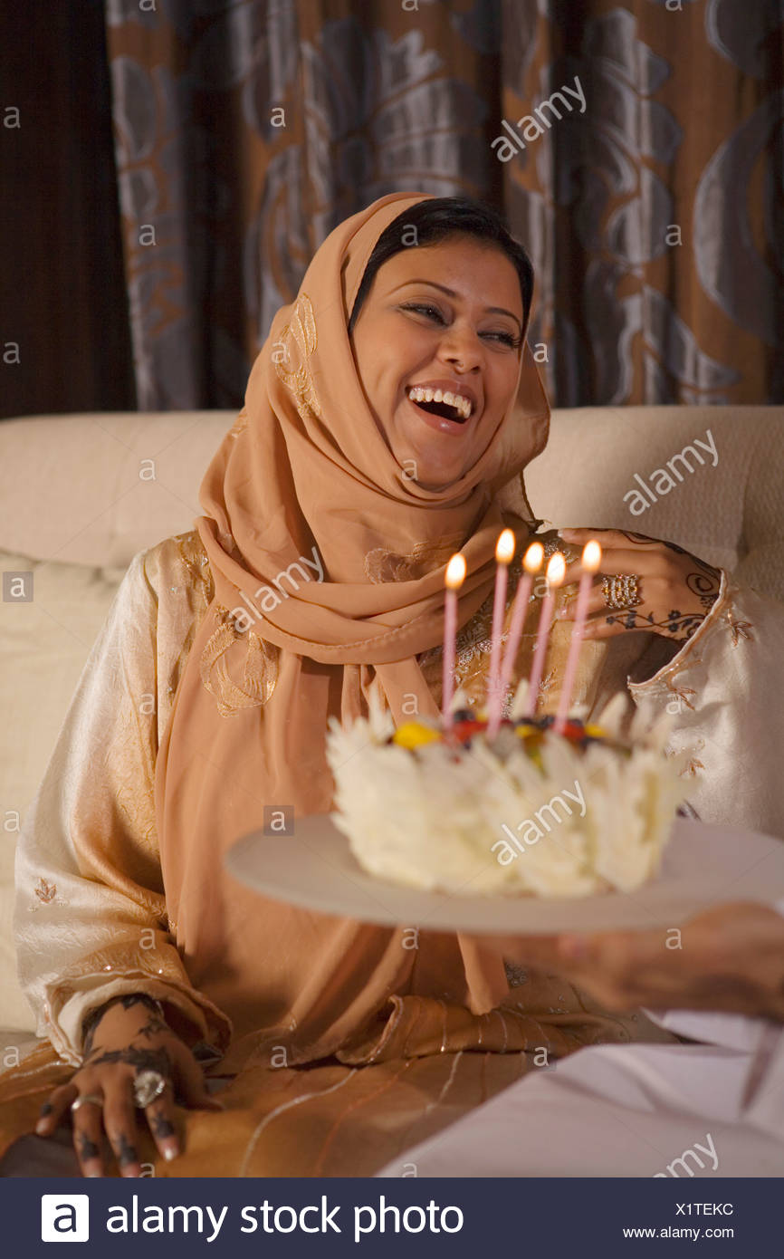 Arab Woman Laughing Birthday Cake High Resolution Stock Photography And Images Alamy