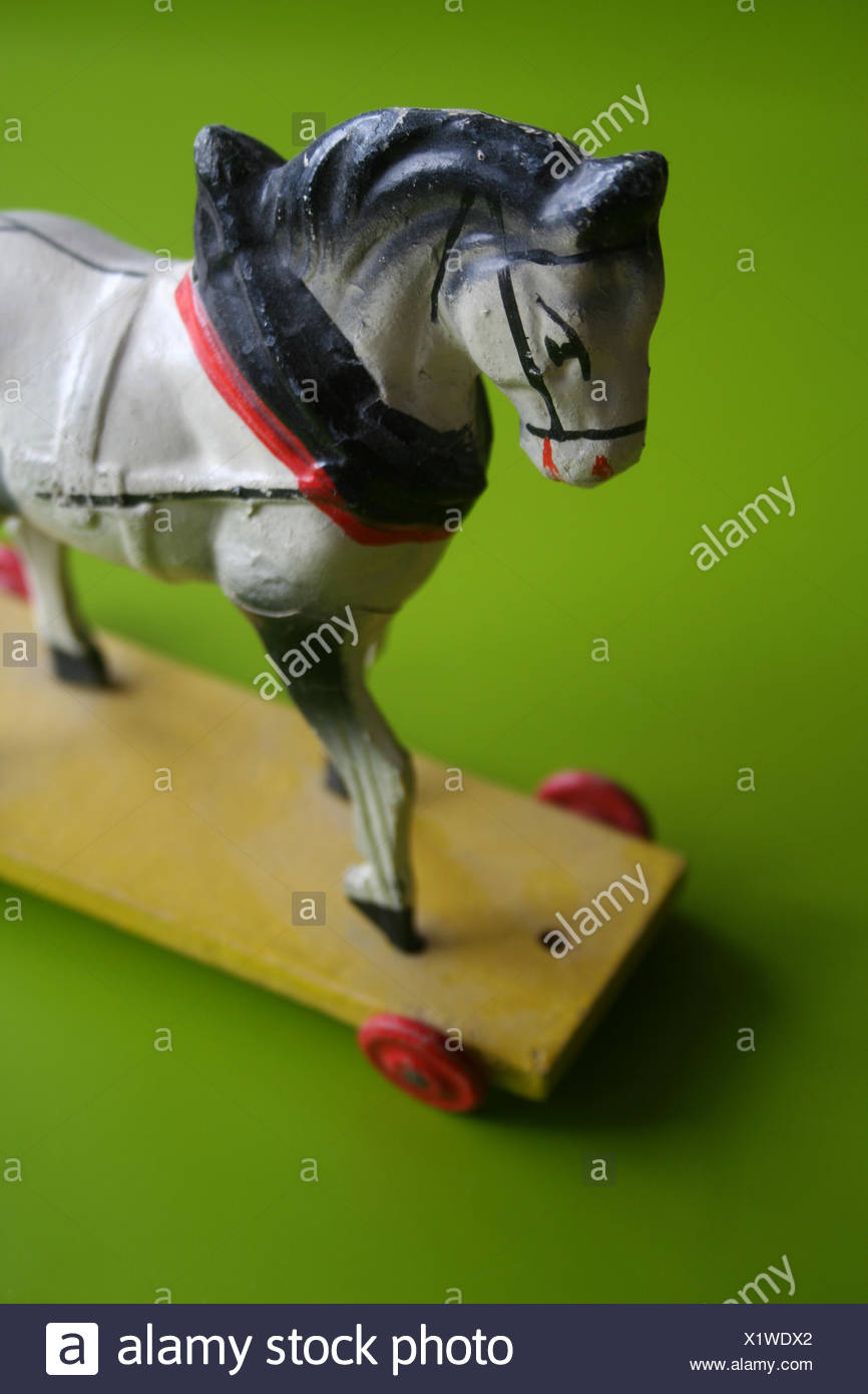 antique toy horse on wheels