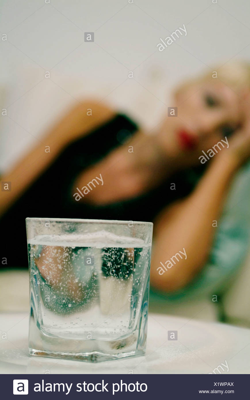 Out Of Focus Female Short Blonde Hair And Red Lipstick Wearing