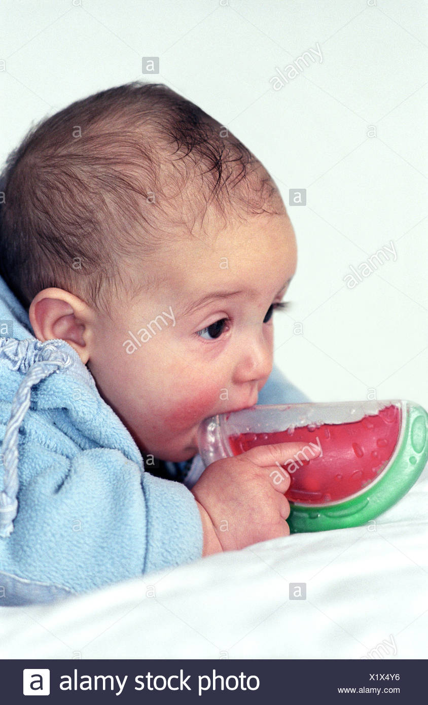 baby chewing on dummy