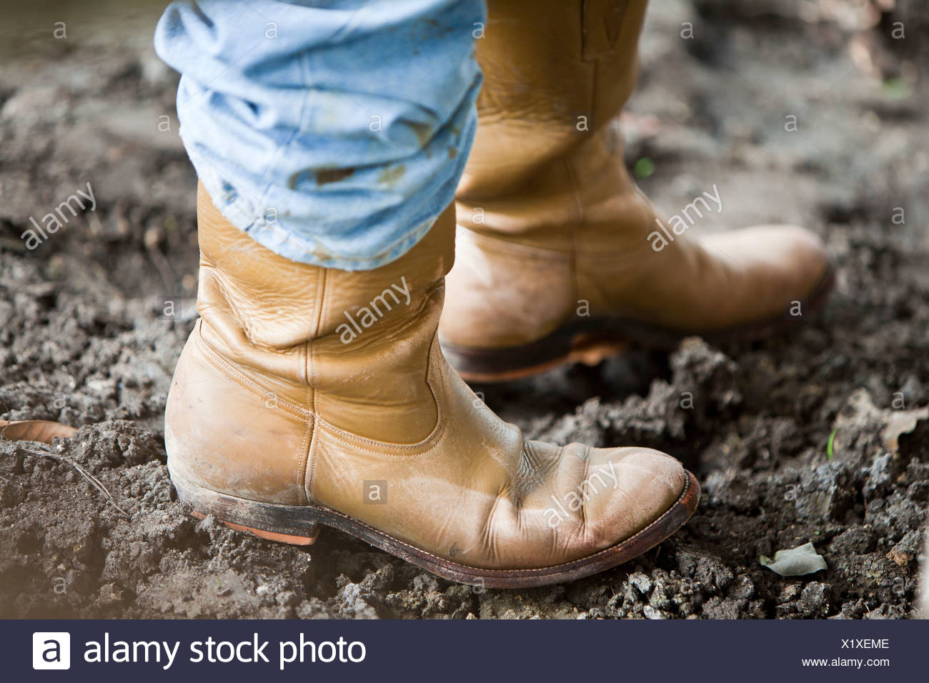 leather boots in mud