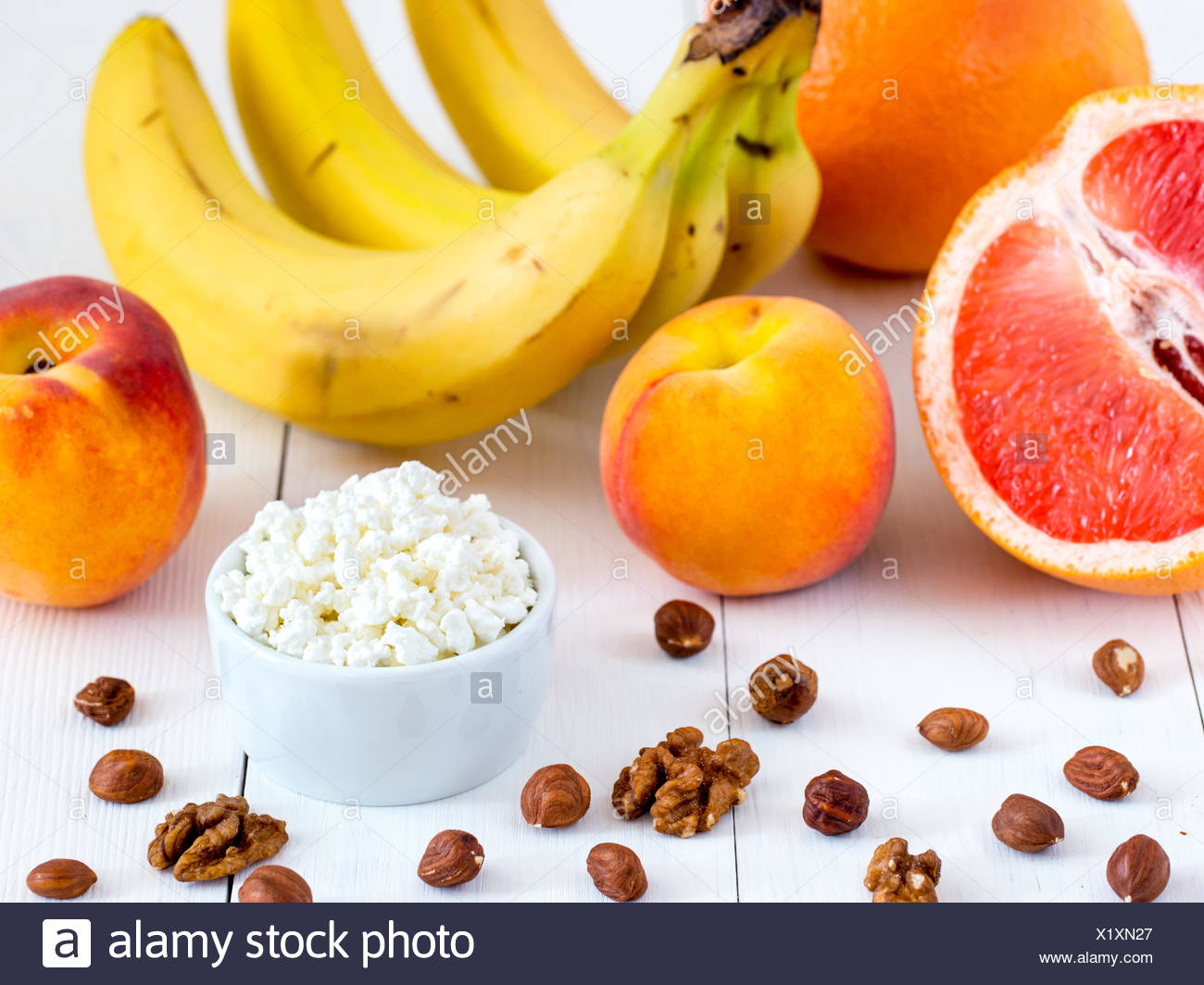 Dieting Cottage Cheese With Fresh Fruits And Nuts Stock Photo