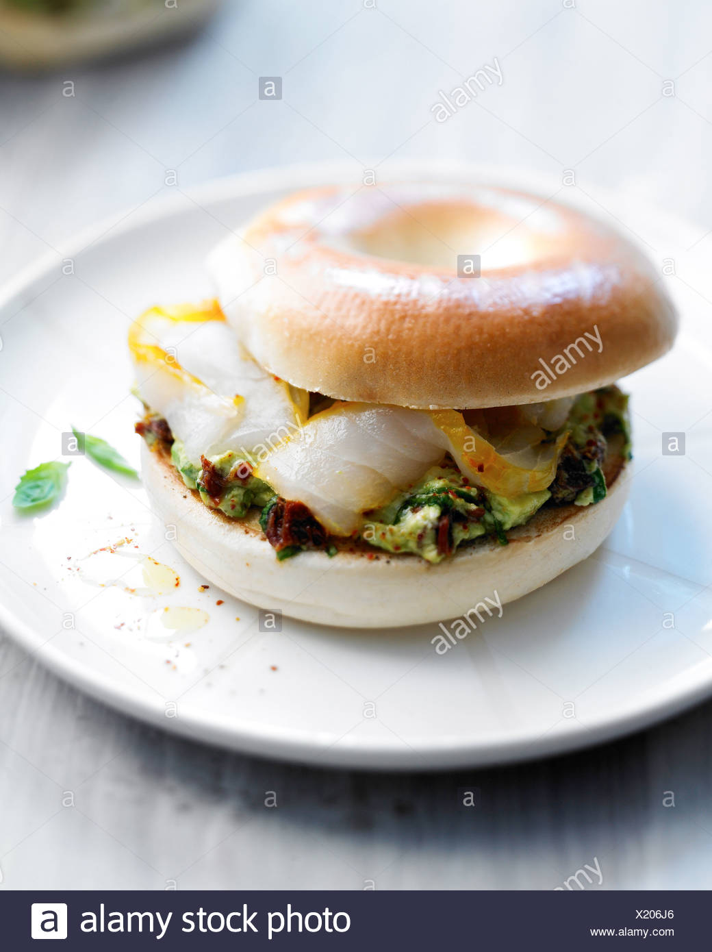 Avocado Cottage Cheese And Smoked Fish Bagel Sandwich Stock Photo