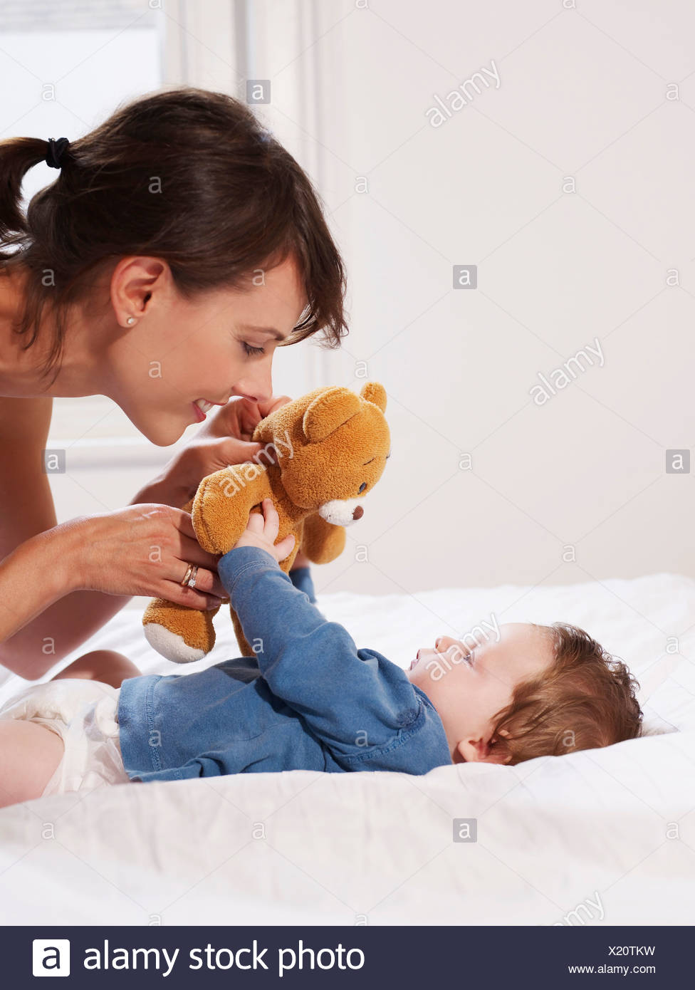 baby and teddy bear