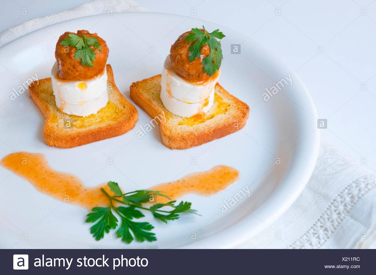 Spanish Tapa Meatballs And Cottage Cheese On Toast Stock Photo