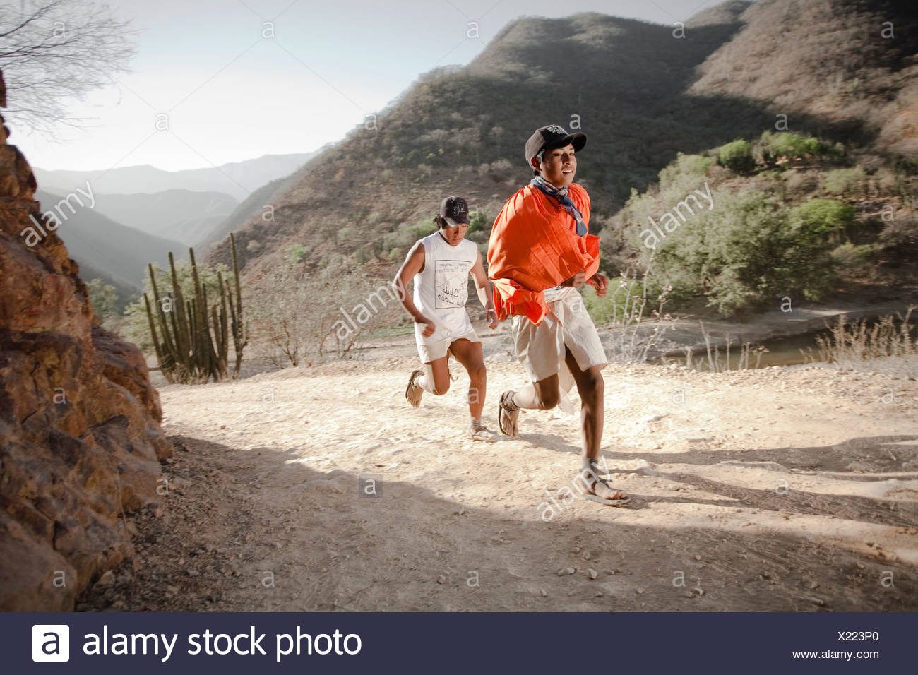 Two Young Tarahumara Runners Running Dressed With Traditional Clothes During An Ultra Marathon In Urique Chihuahua Mexico Stock Photo Alamy