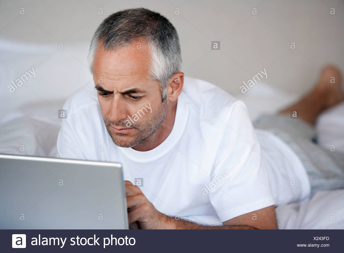 Lying On Stomach Stock Photos & Lying On Stomach Stock Images Alamy