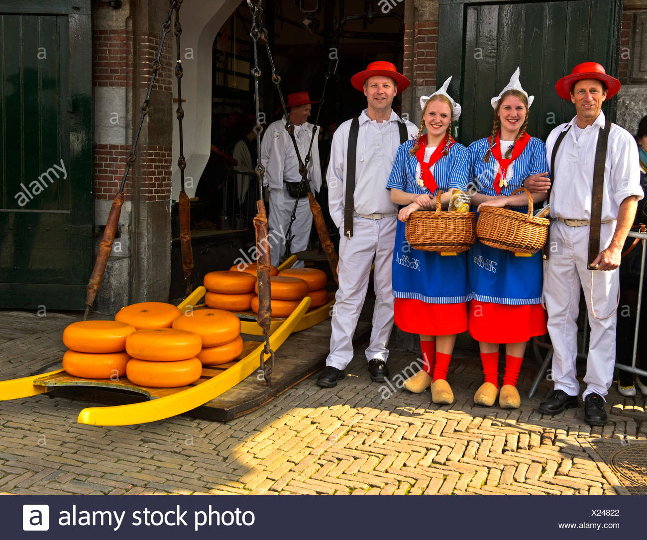 Cheesemaker setting up a stall at a winter market