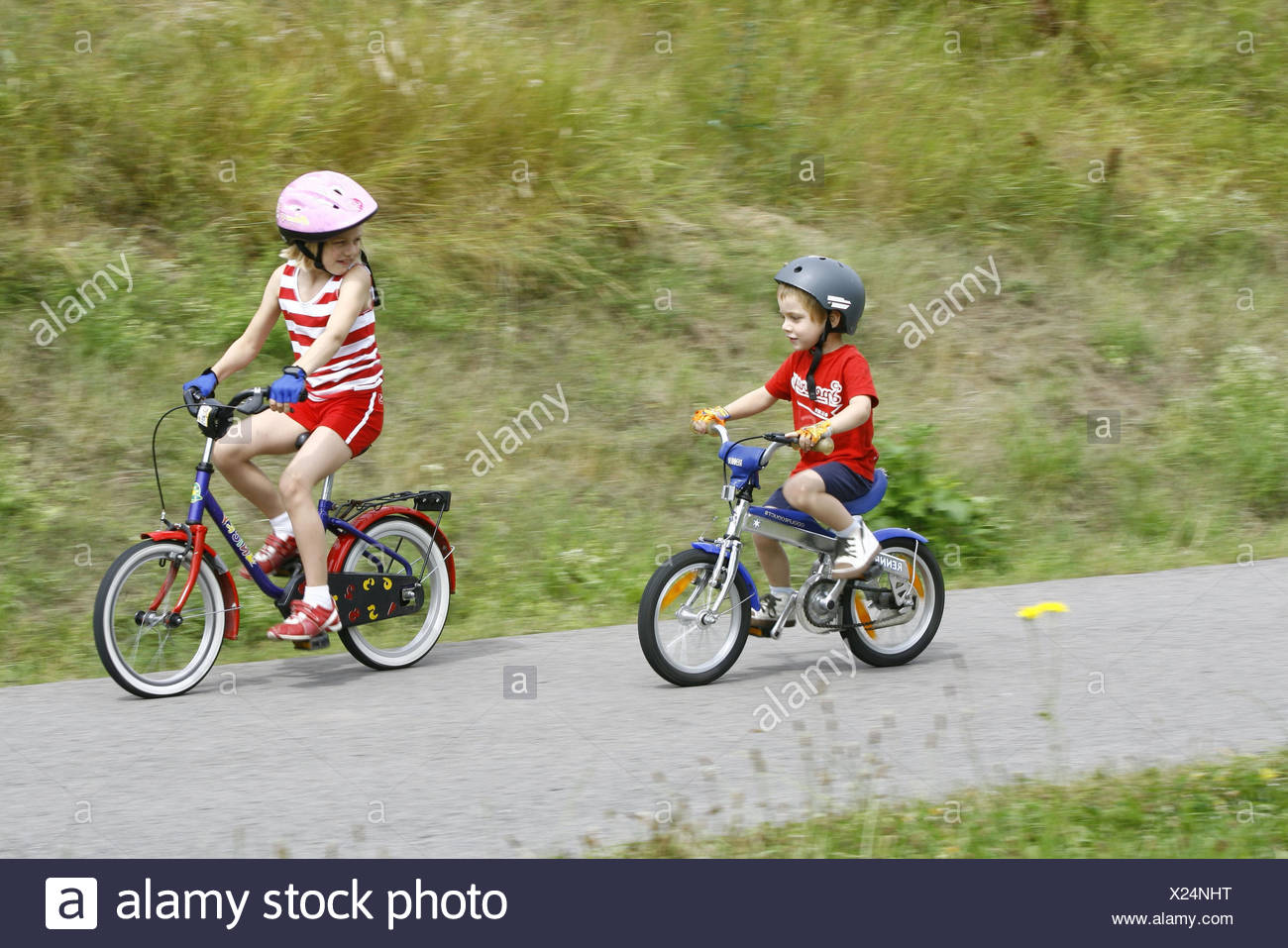 children driving bike