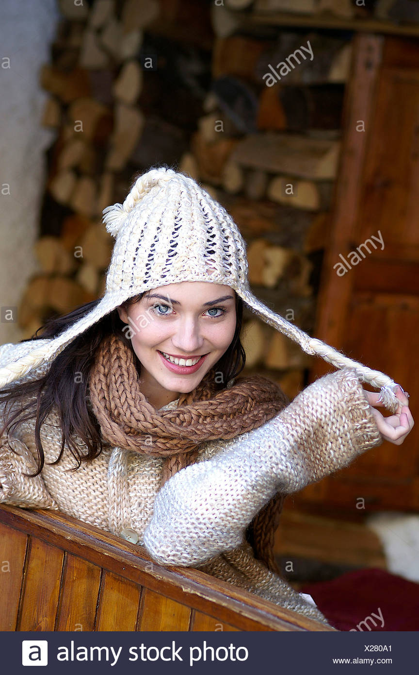 black hat with cream bobble
