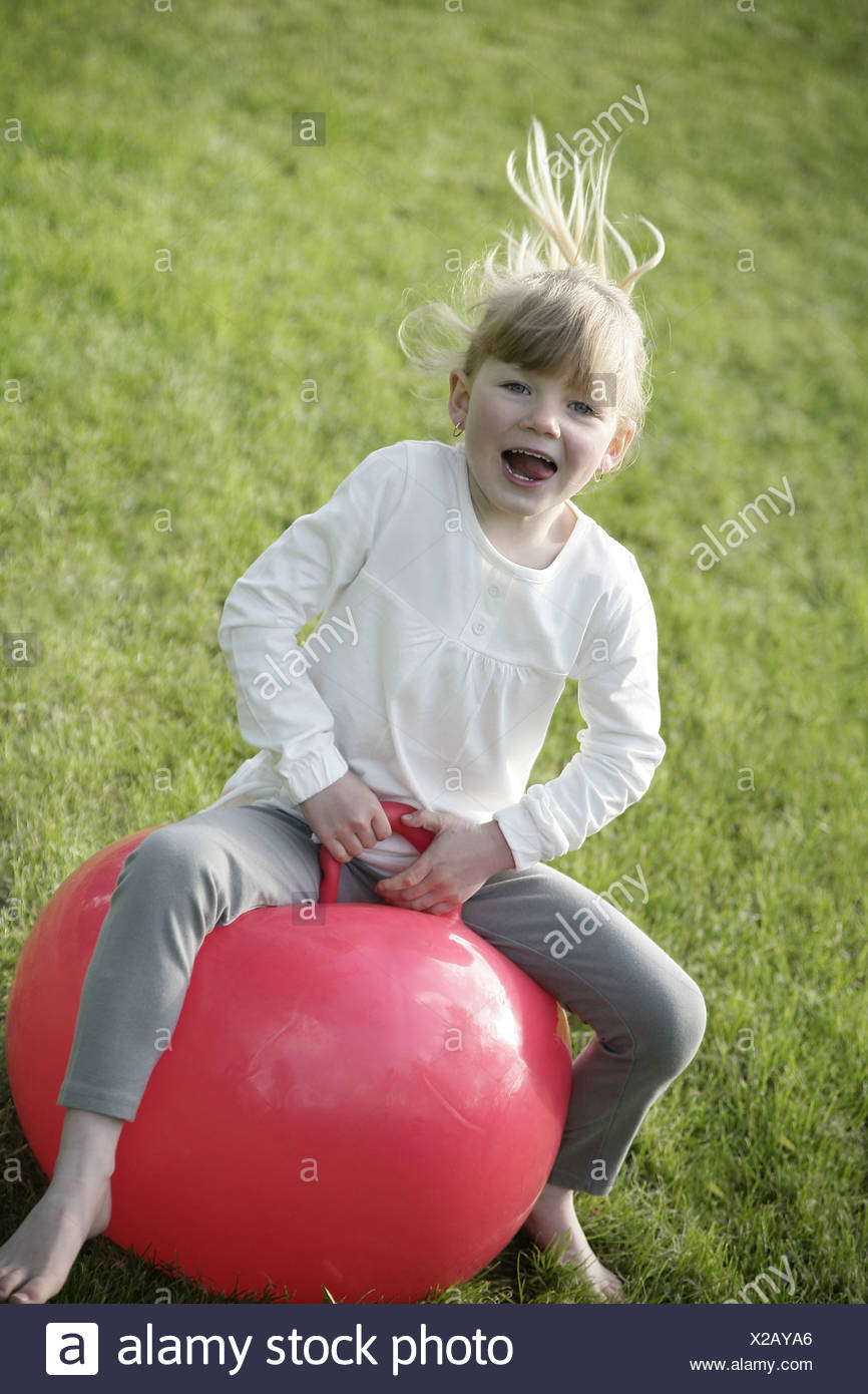 red bouncy ball with handle