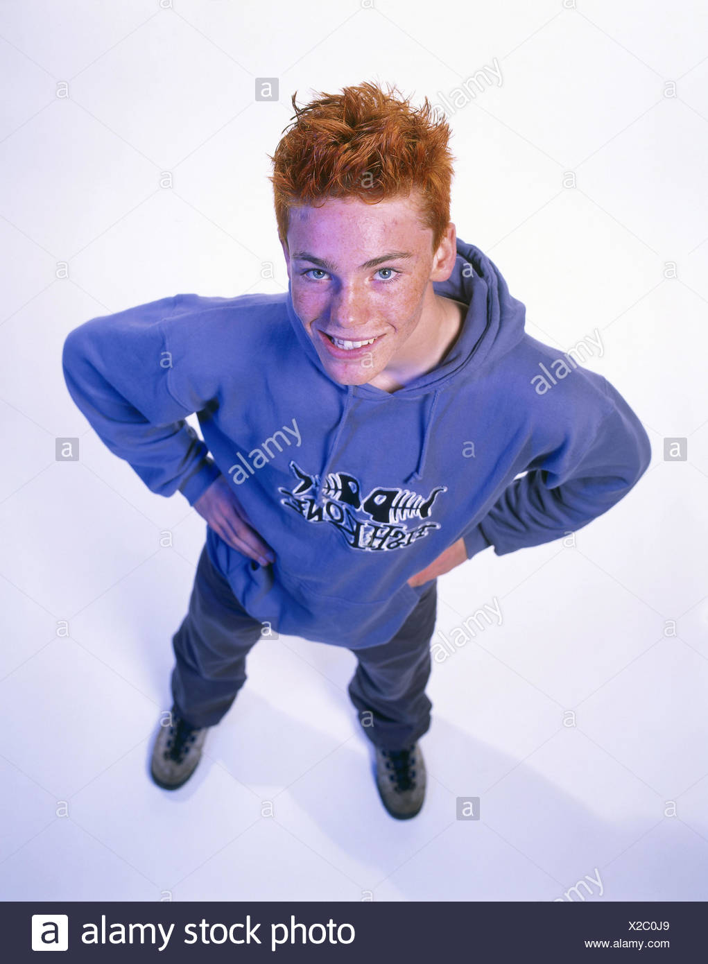 Boy Red Haired Smile Hands Hips Raise The Eyes Teenager