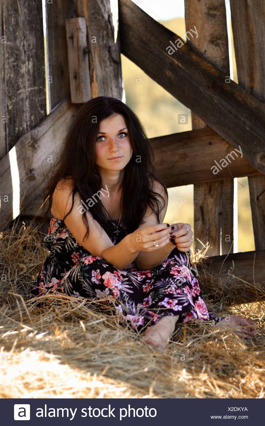 Relaxing Serious Calm Brunette Girl With Blue Eyes Portrait Of