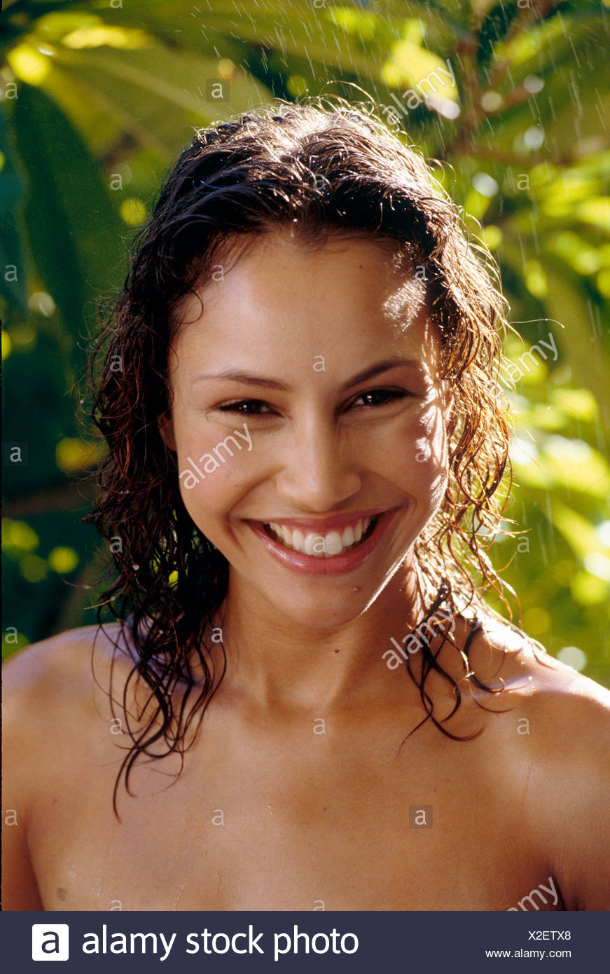 Female Long Wavy Wet Brunette Hair Standing In Rain Water