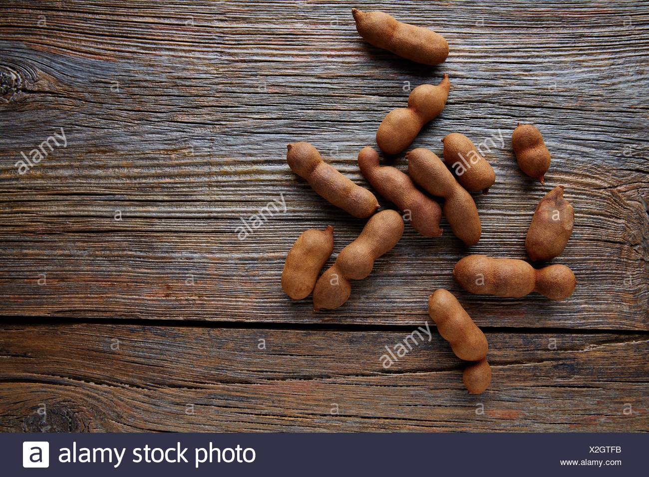 Tamarindo Tamarind Fruits Ripe On Brown Wood Background Uses For Candy Stock Photo Alamy Tamarindo Tamarind Fruits Ripe On Brown Wood Background Uses For Candy Stock Photo Alamy