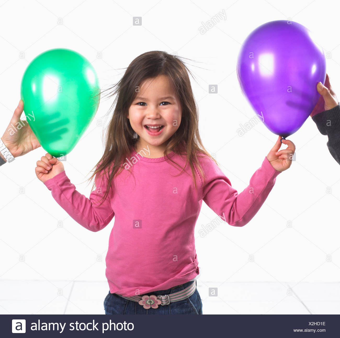 Girl 3 5 Years Standing Laughing As Her Hair Sticks With Static