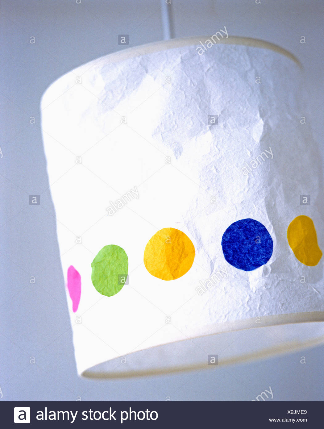 Close Up Of Hand Made White Paper Lampshade Decorated With Large