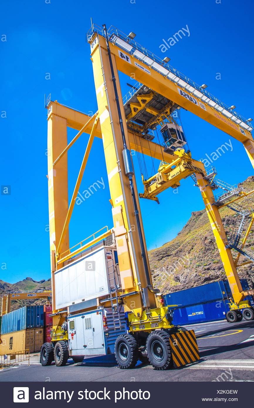 Crane Lifting Shipping Container High Resolution Stock Photography and