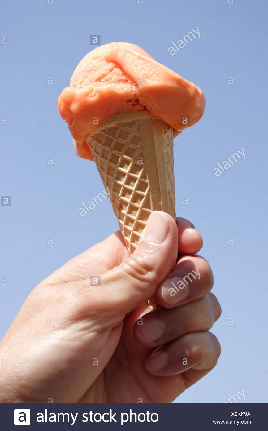 Hand Orange Water Ice Ice Cream Ice Cream Icecream Dessert Present Indicate Stock Photo Alamy